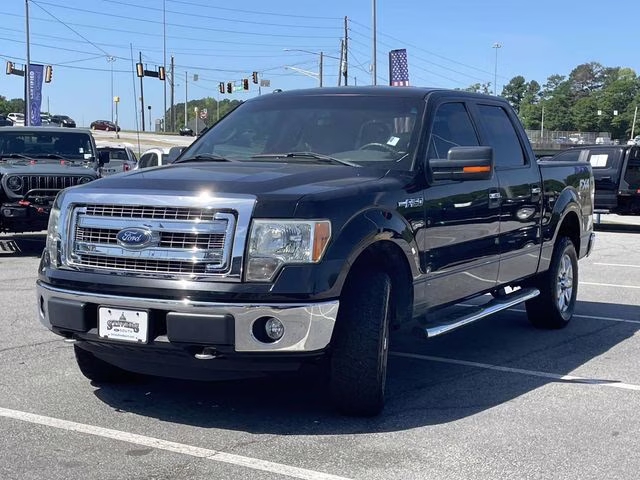 2013 Tuxedo Black Metallic Ford F-150 XLT 4X4 Truck