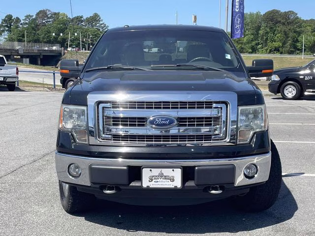 2013 Tuxedo Black Metallic Ford F-150 XLT 4X4 Truck