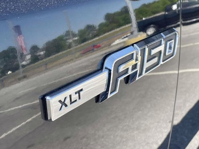 2013 Tuxedo Black Metallic Ford F-150 XLT 4X4 Truck