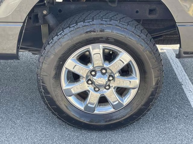 2013 Tuxedo Black Metallic Ford F-150 XLT 4X4 Truck