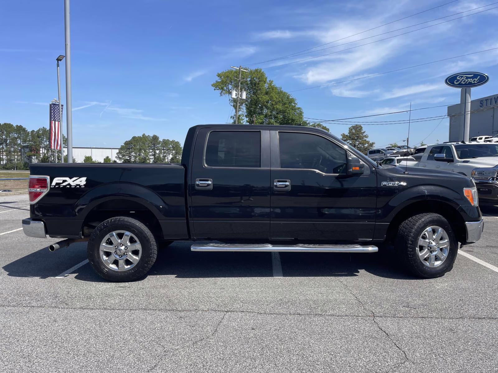 2013 Tuxedo Black Metallic Ford F-150 XLT 4X4 Truck