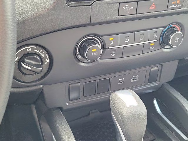 2023 Gun Metallic Nissan Frontier SV 4X4 Truck