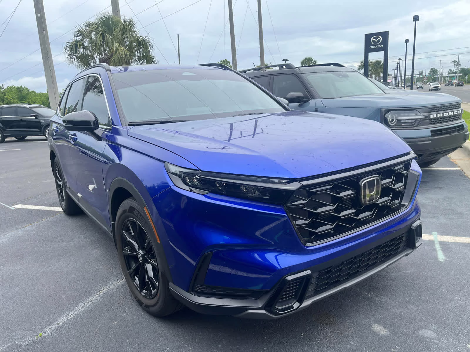 2024 Still Night Pearl Honda CR-V Hybrid Sport-L FWD SUV