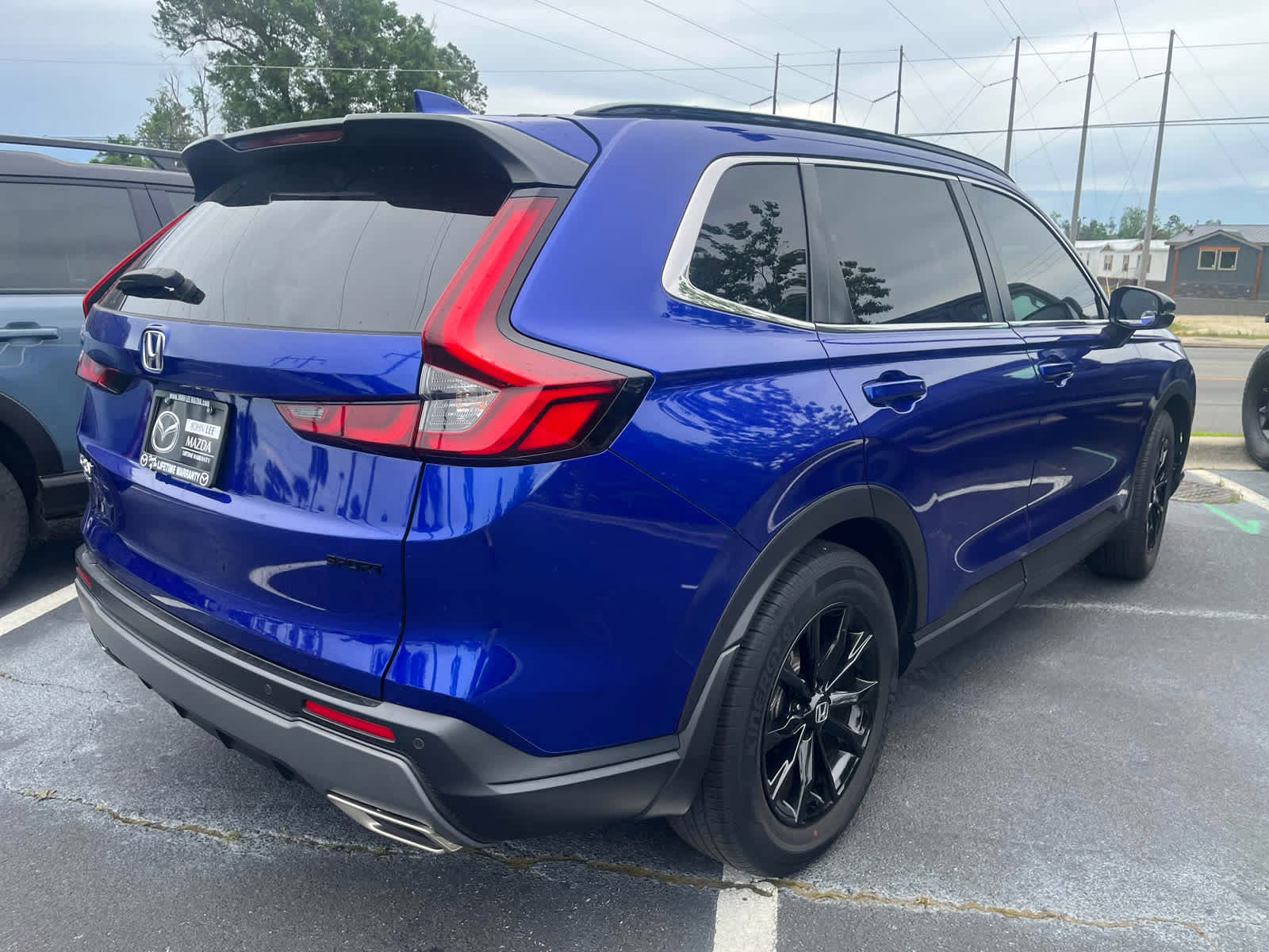 2024 Still Night Pearl Honda CR-V Hybrid Sport-L FWD SUV
