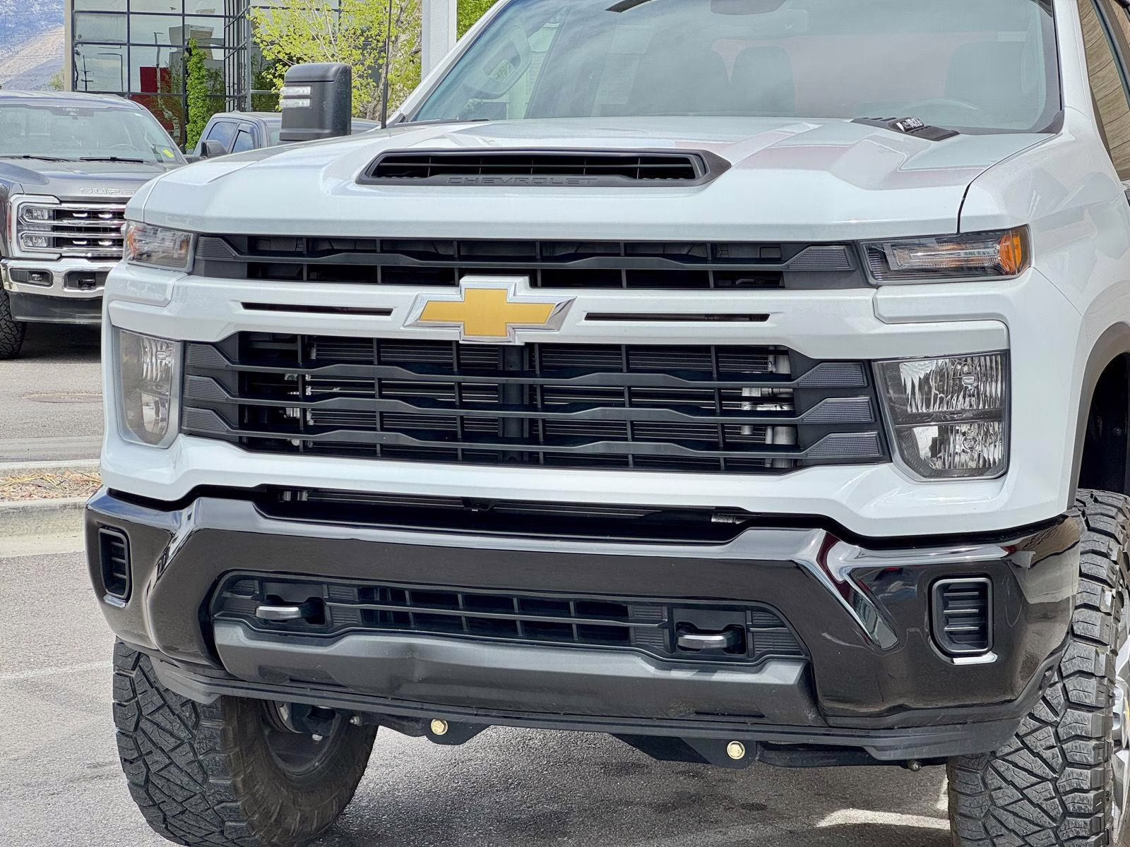 2024 Summit White Chevrolet Silverado 2500HD Custom 4X4 Truck