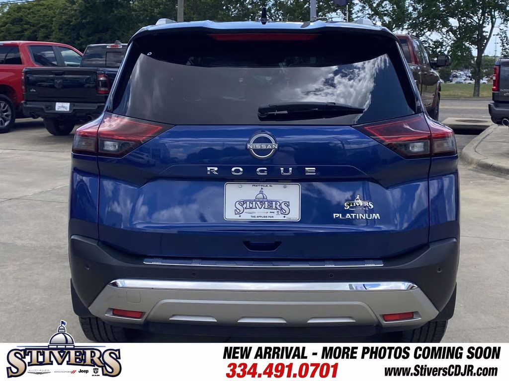 2023 Caspian Blue Metallic/Super Black Nissan Rogue Platinum FWD SUV