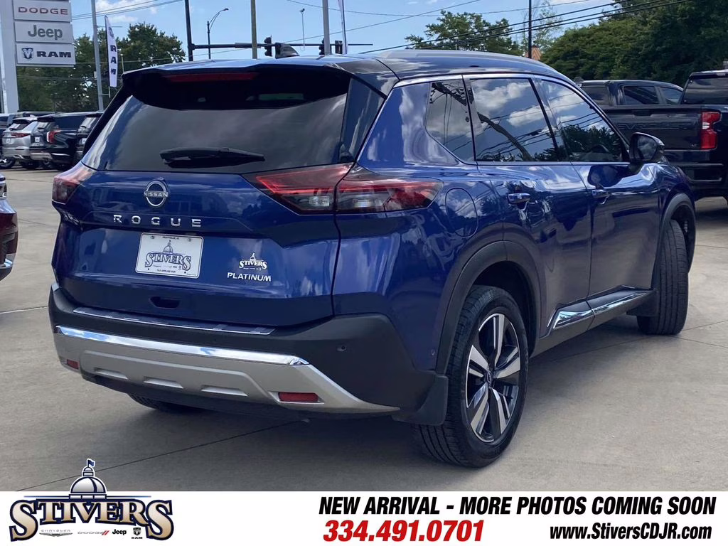 2023 Caspian Blue Metallic/Super Black Nissan Rogue Platinum FWD SUV