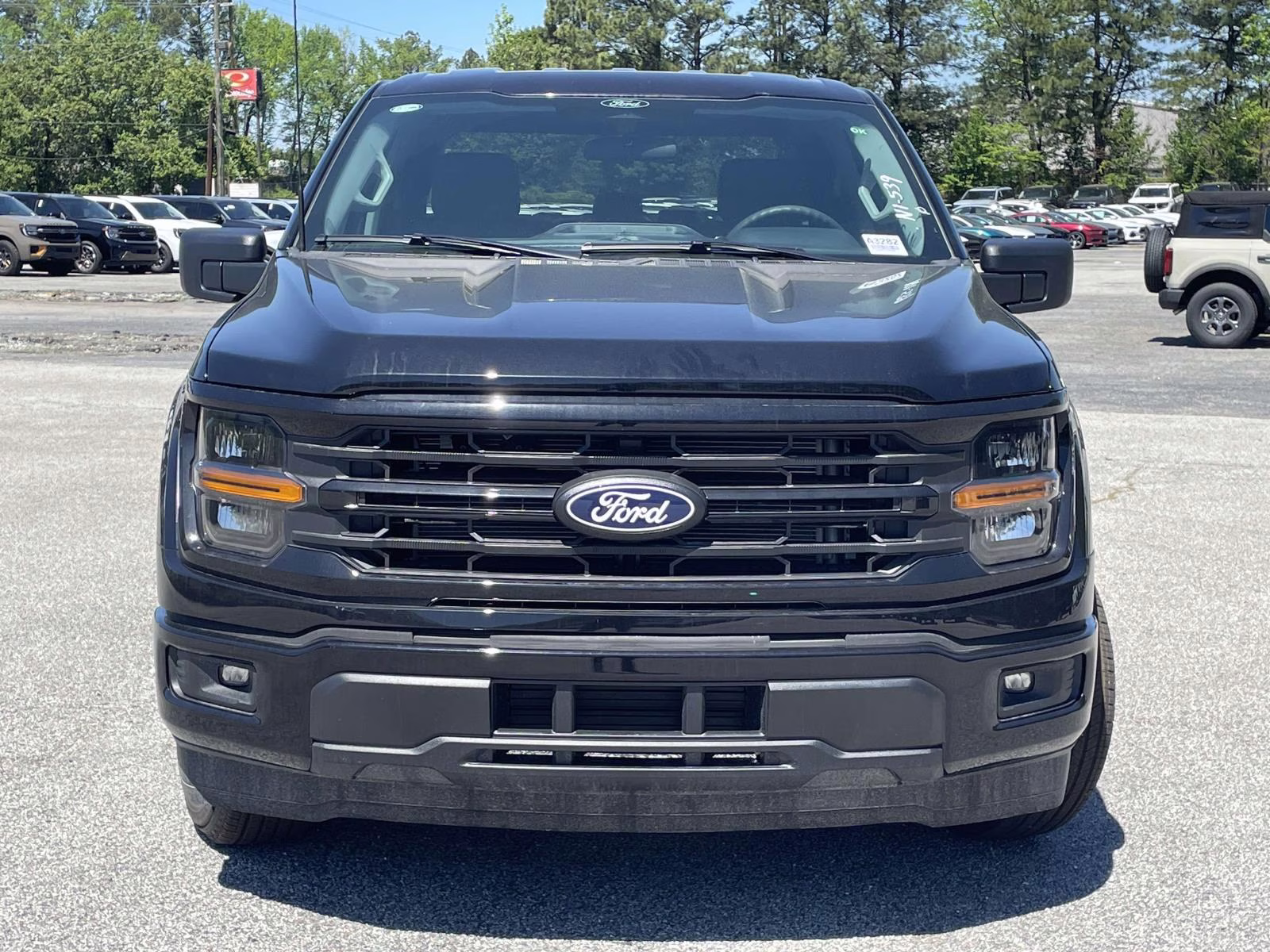 2026 Black Metallic Ford F-150 XLT RWD Truck