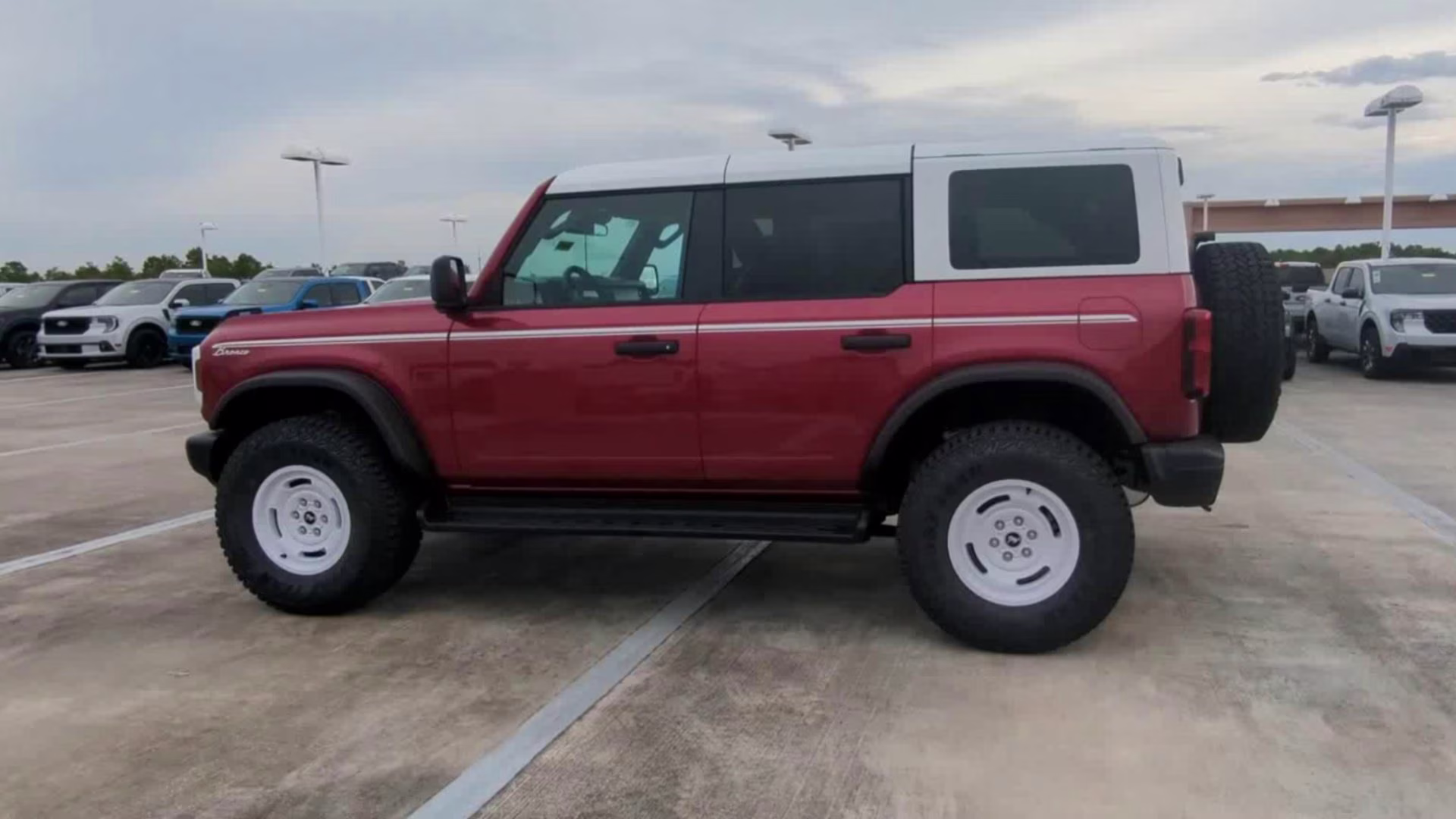 2026 Ruby Red Metallic Tinted Clearcoat Ford Bronco Heritage Edition 4X4 Convertible