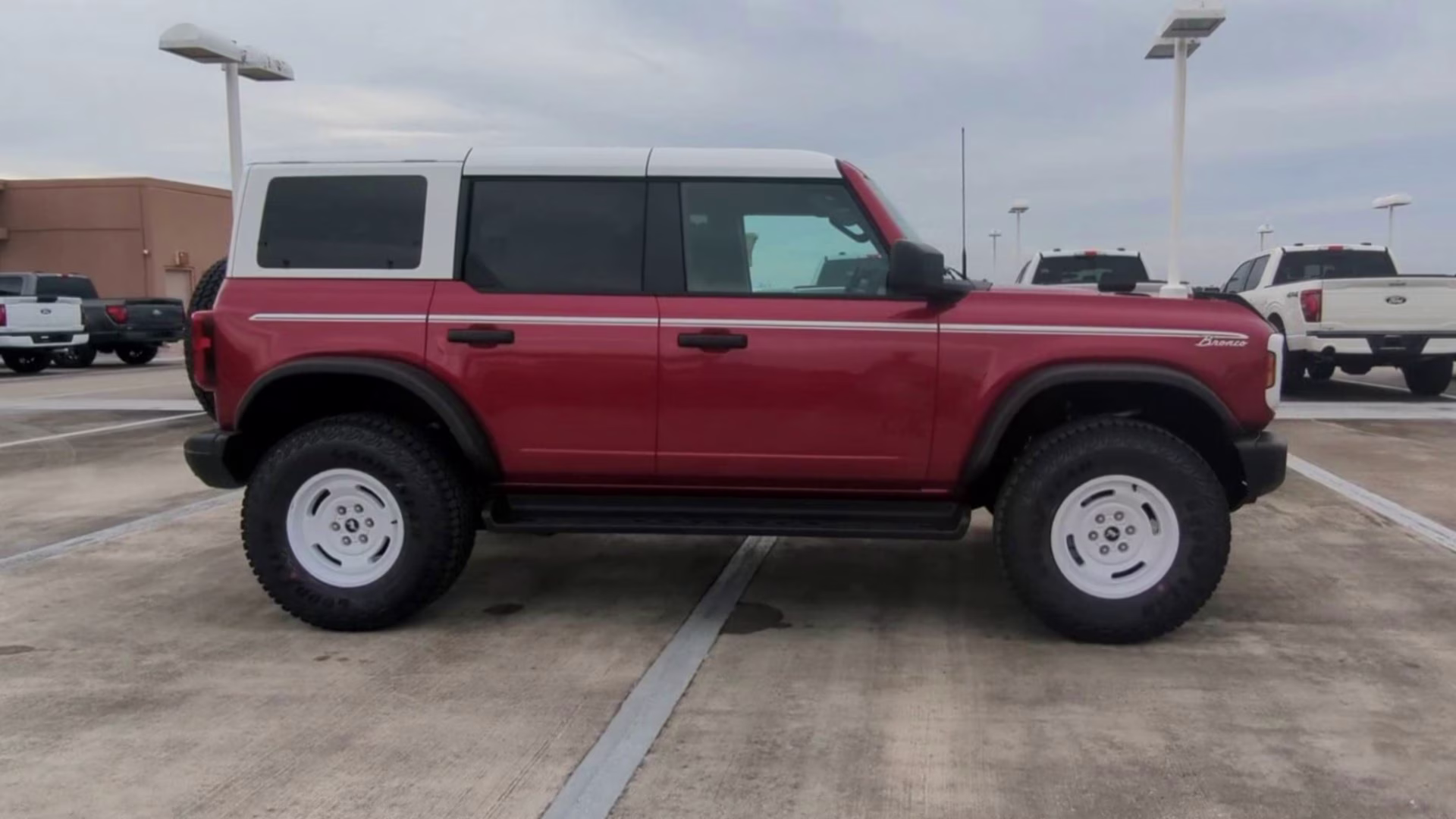 2026 Ruby Red Metallic Tinted Clearcoat Ford Bronco Heritage Edition 4X4 Convertible