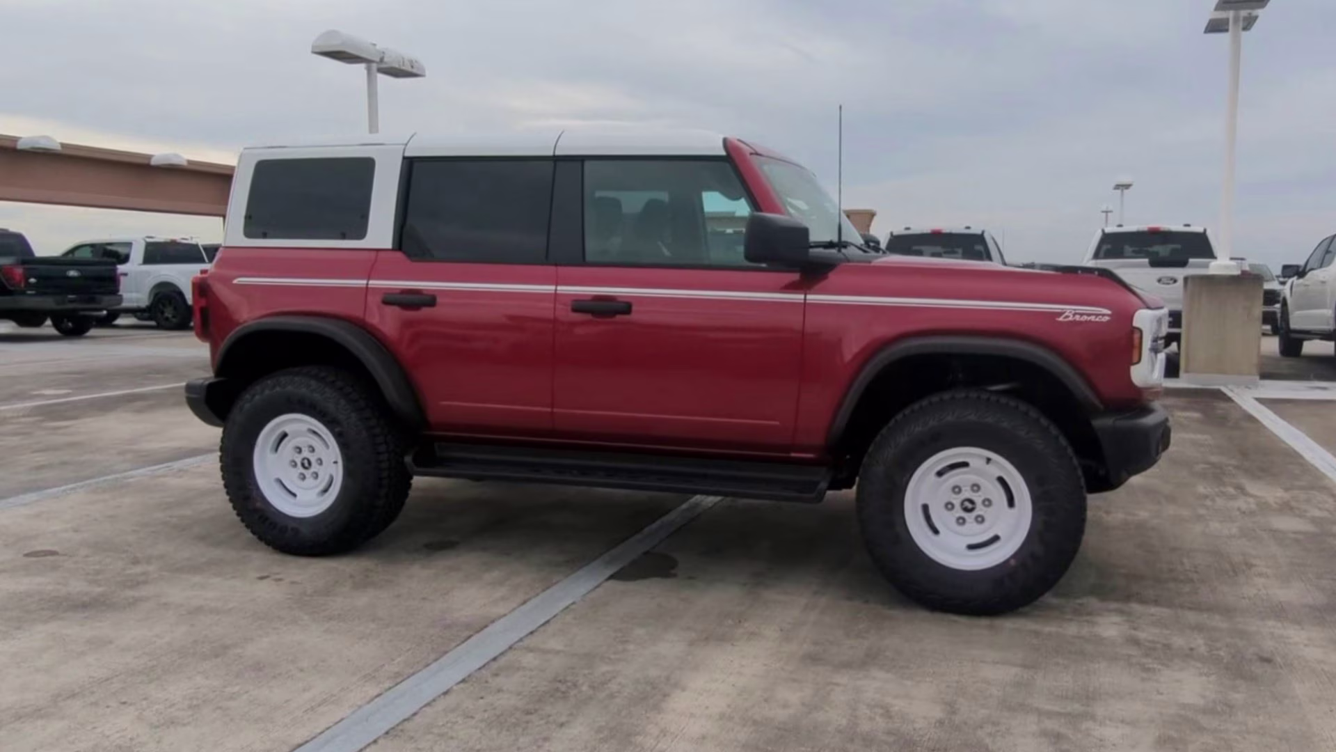 2026 Ruby Red Metallic Tinted Clearcoat Ford Bronco Heritage Edition 4X4 Convertible