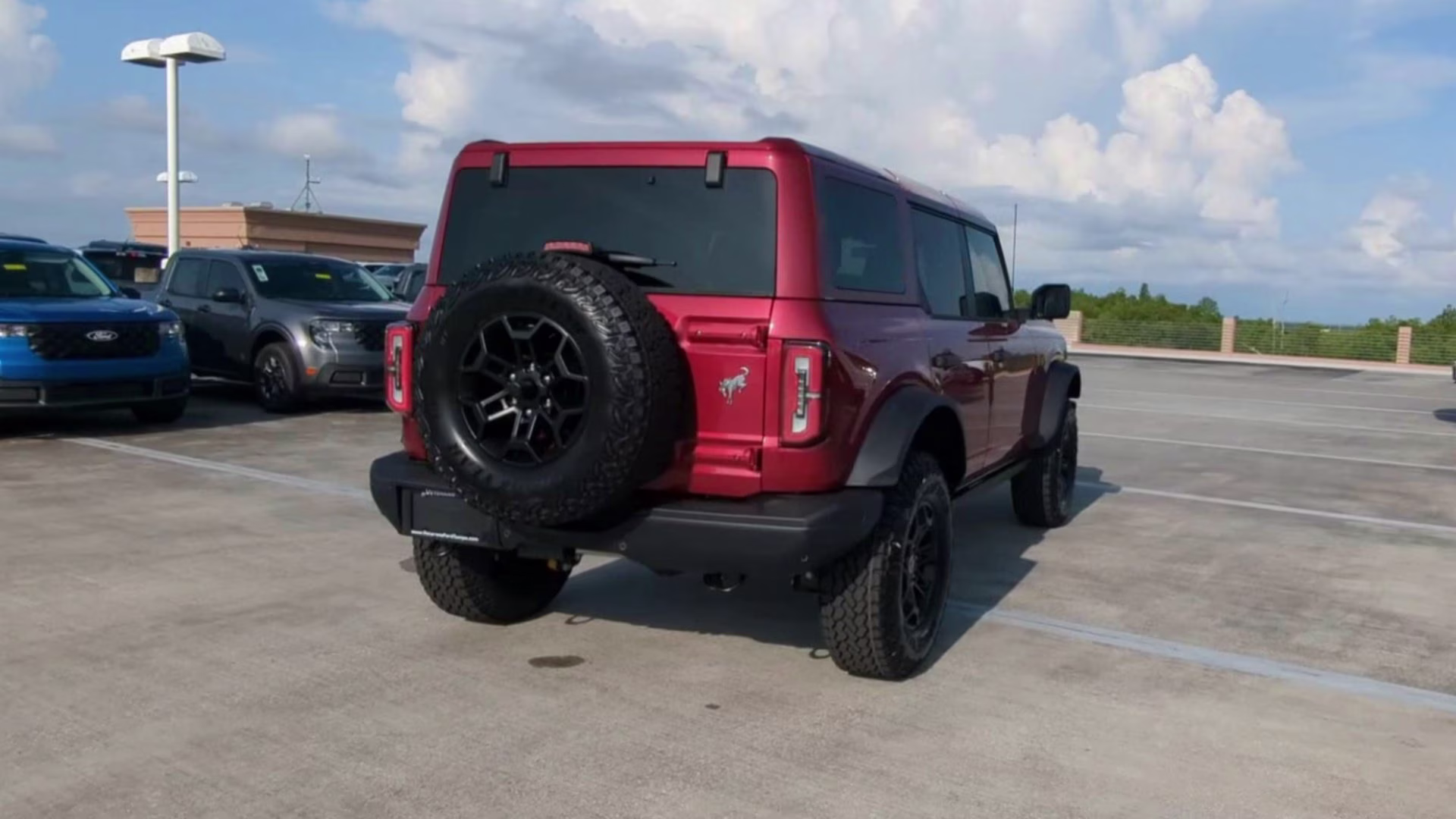 2026 Ruby Red Metallic Tinted Clearcoat Ford Bronco Badlands 4X4 Convertible