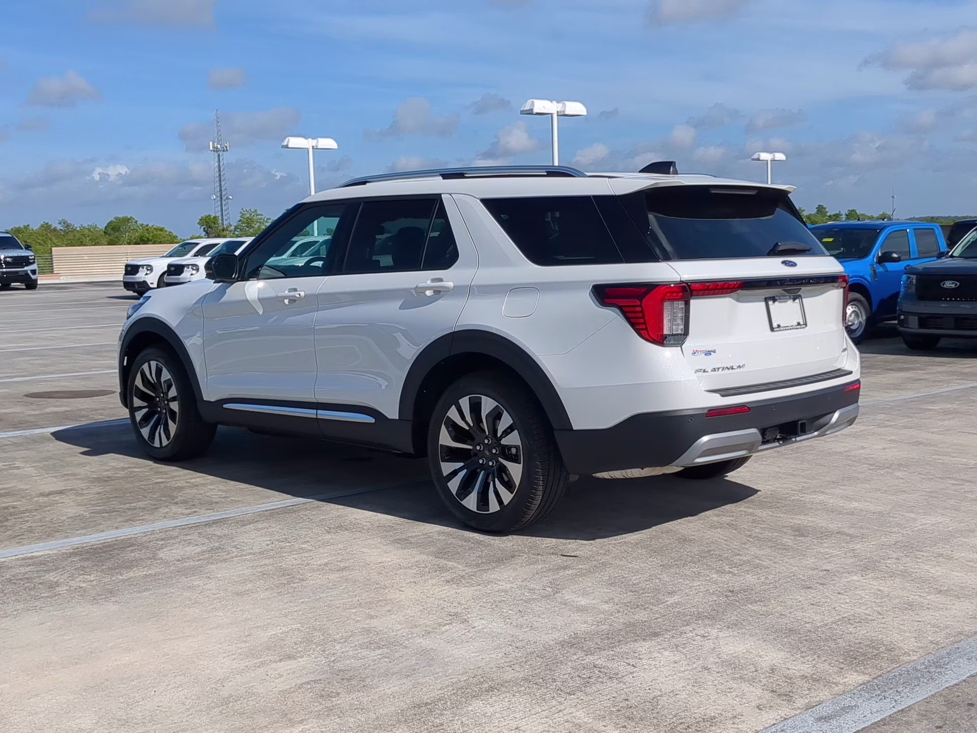 2026 Star White Metallic Tri-Coat Ford Explorer Platinum 4X4 SUV