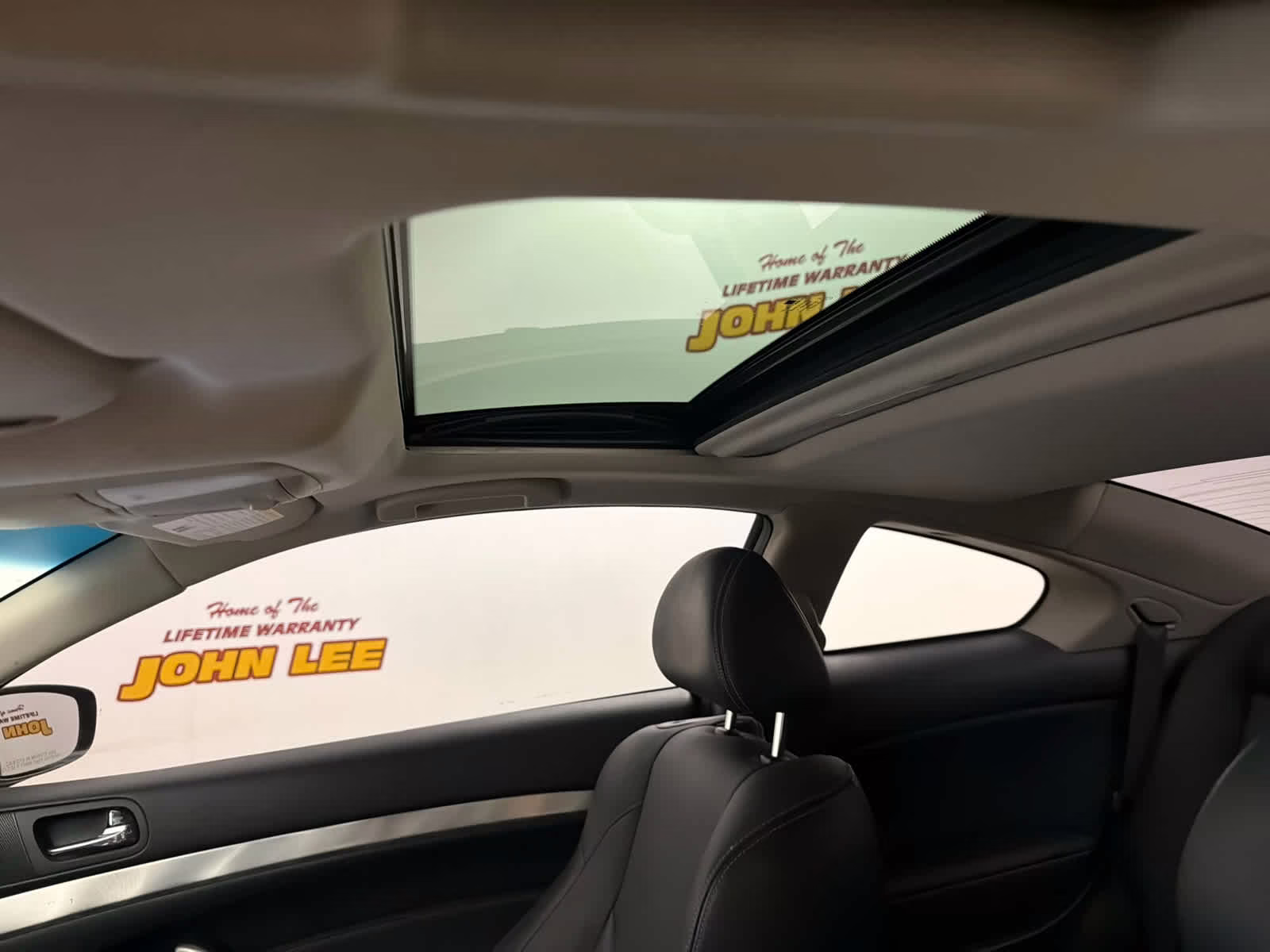 2015 Black Obsidian INFINITI Q60 Coupe AWD Sedan