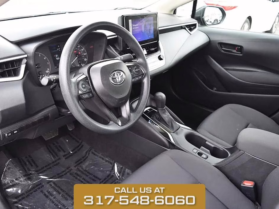 2025 Midnight Black Metallic Toyota Corolla LE FWD Sedan