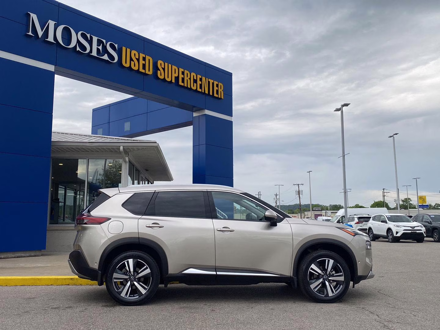 2023 Champagne Silver Metallic Nissan Rogue Platinum AWD SUV