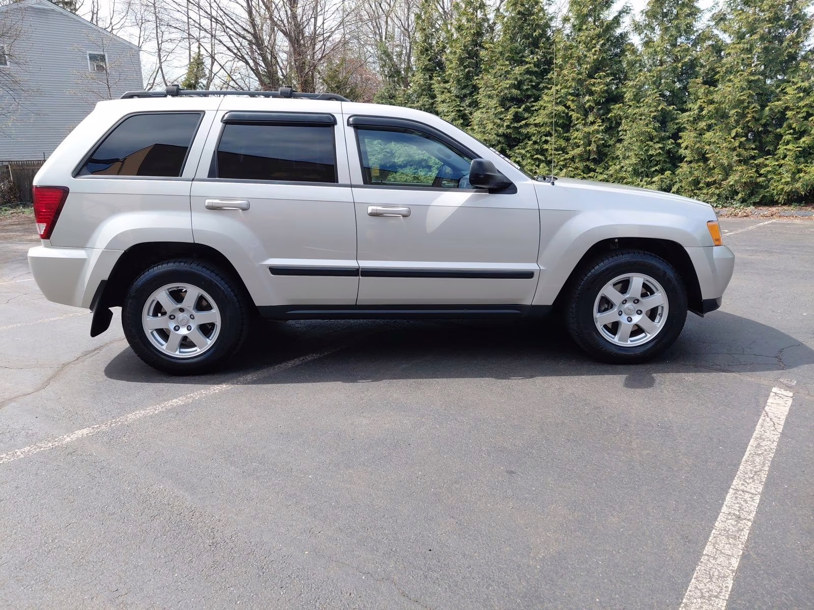 2009 Light Graystone Pearlcoat Jeep Grand Cherokee Laredo 4X4 SUV