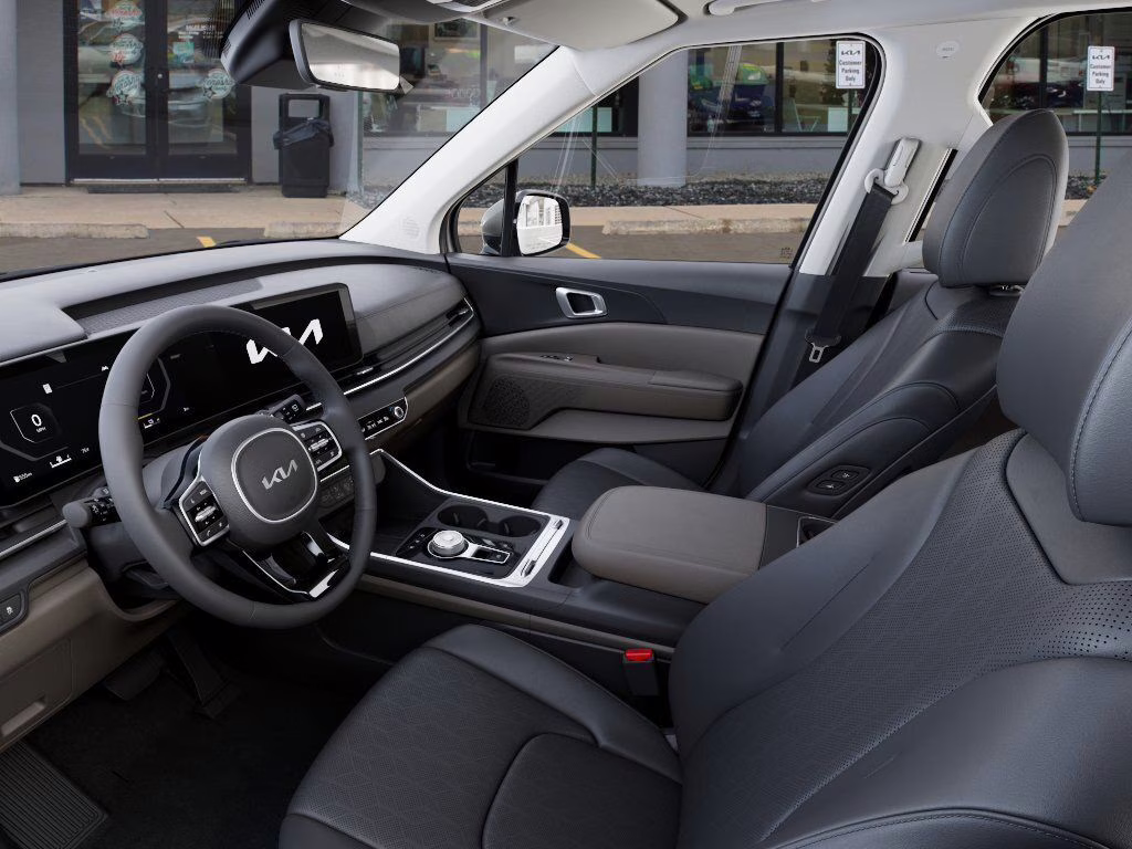 2026 Ivory Silver Kia Carnival Hybrid SX FWD Van