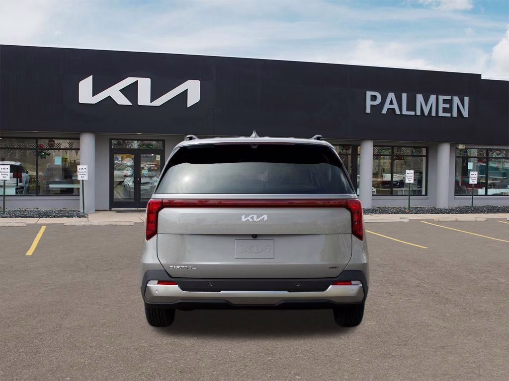 2026 Ivory Silver Kia Carnival Hybrid SX FWD Van