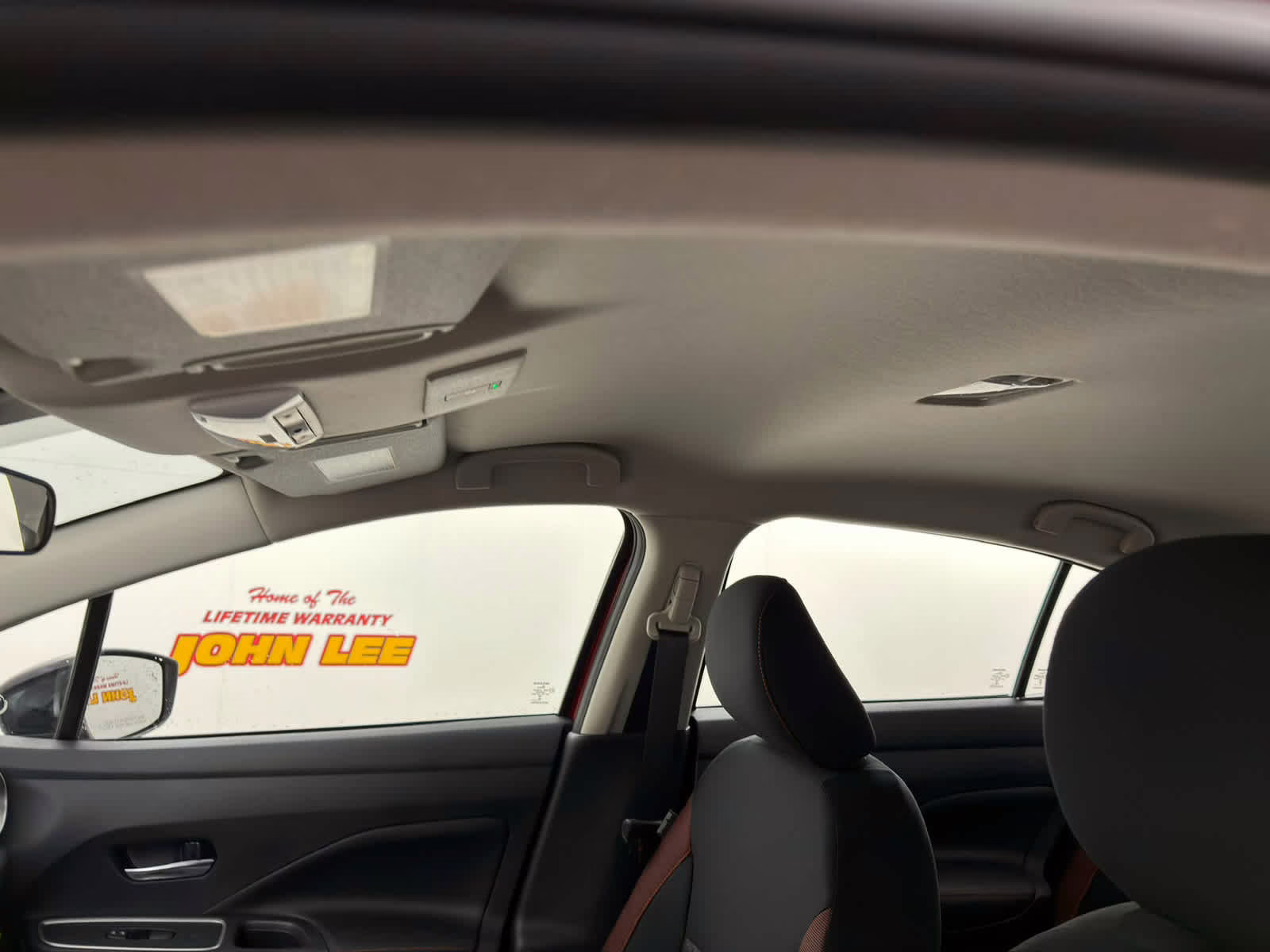 2025 Scarlet Ember Tintcoat Nissan Versa SR FWD Sedan