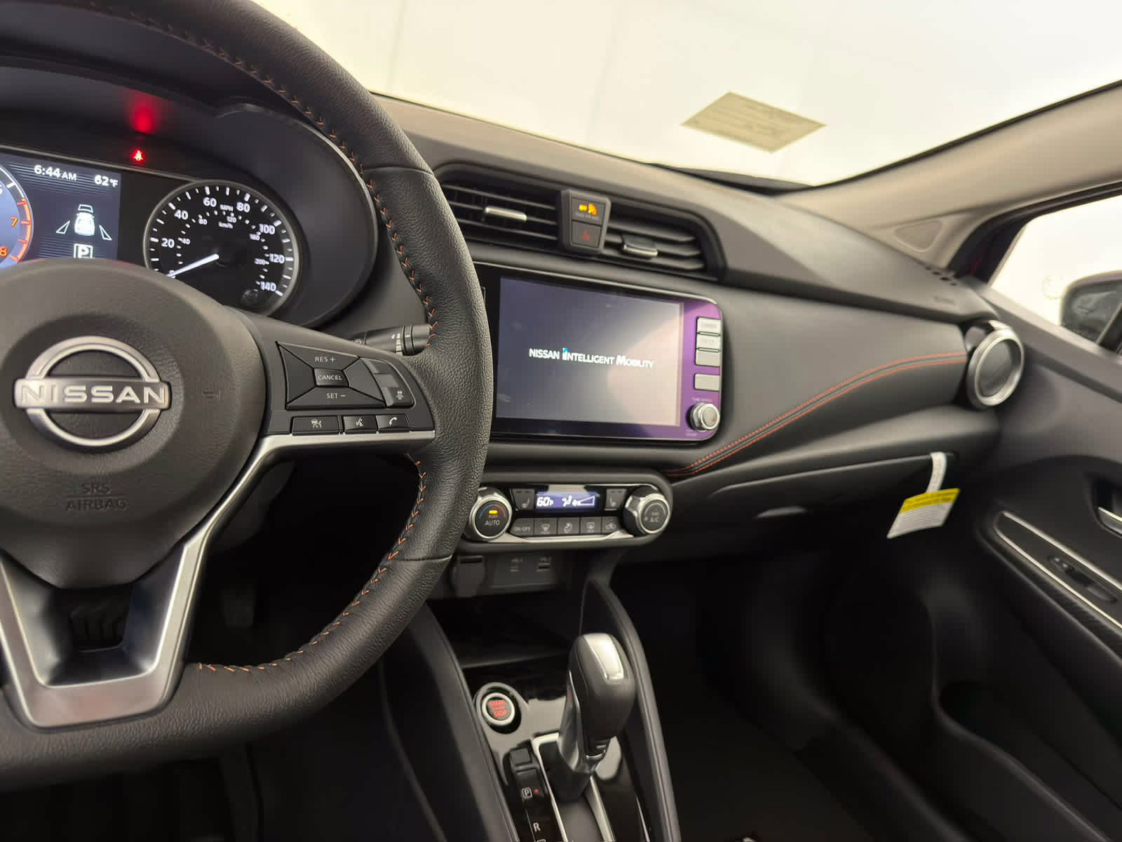 2025 Scarlet Ember Tintcoat Nissan Versa SR FWD Sedan