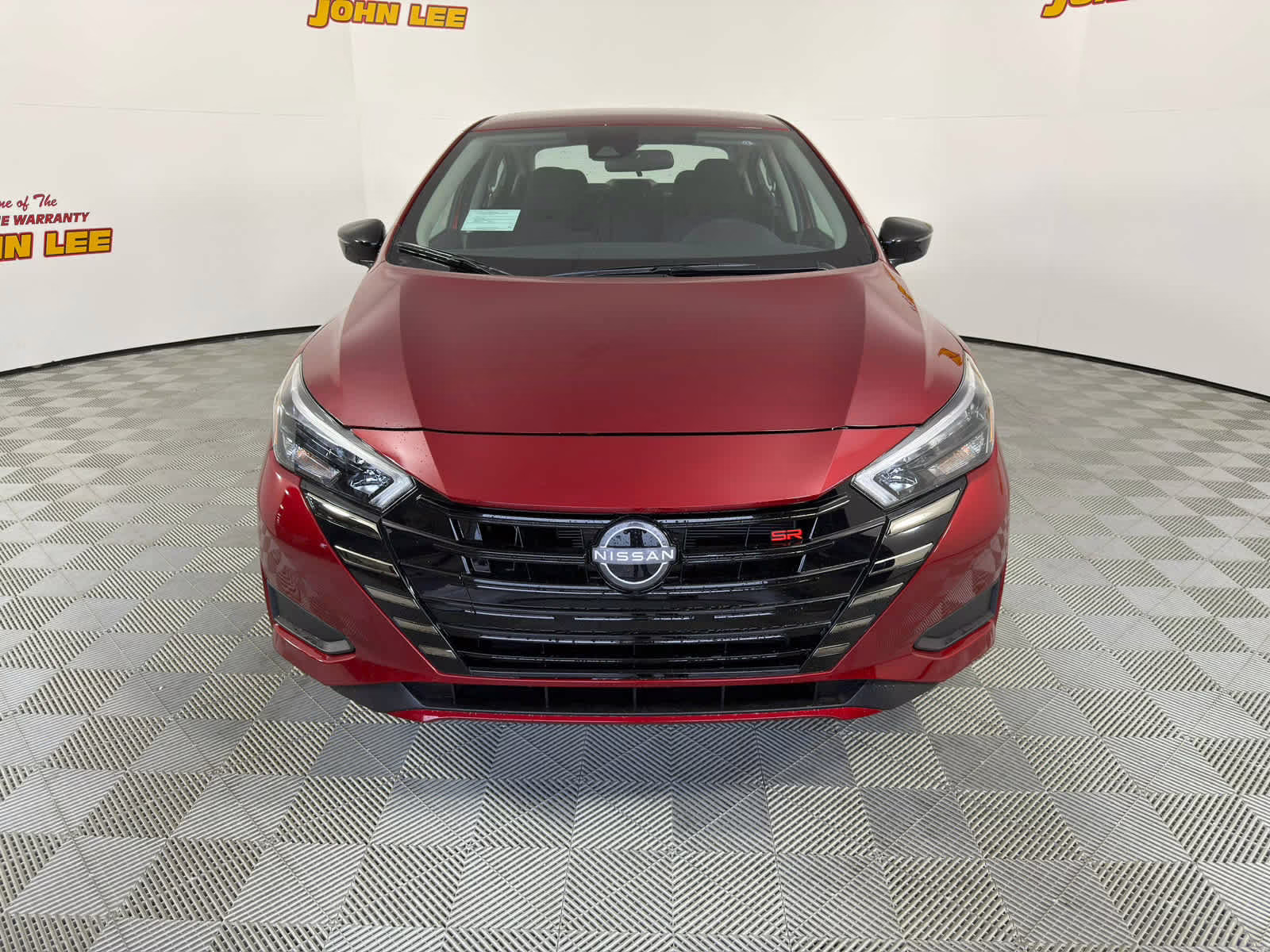 2025 Scarlet Ember Tintcoat Nissan Versa SR FWD Sedan