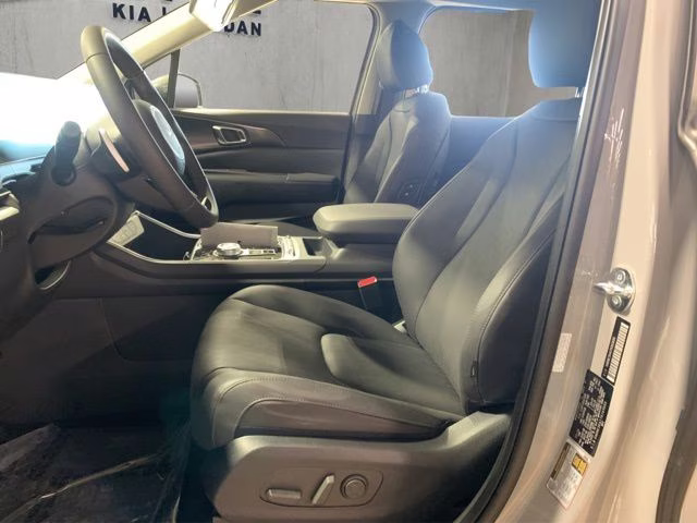 2026 Ceramic Silver Kia Carnival Hybrid SX FWD Van