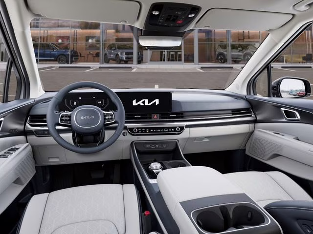 2026 Snow White Pearl Kia Carnival Hybrid SX FWD Van