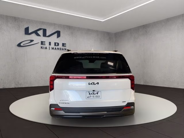 2026 Snow White Pearl Kia Carnival Hybrid SX FWD Van