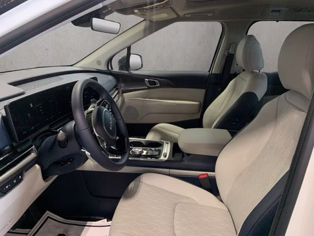 2026 Snow White Pearl Kia Carnival Hybrid SX FWD Van