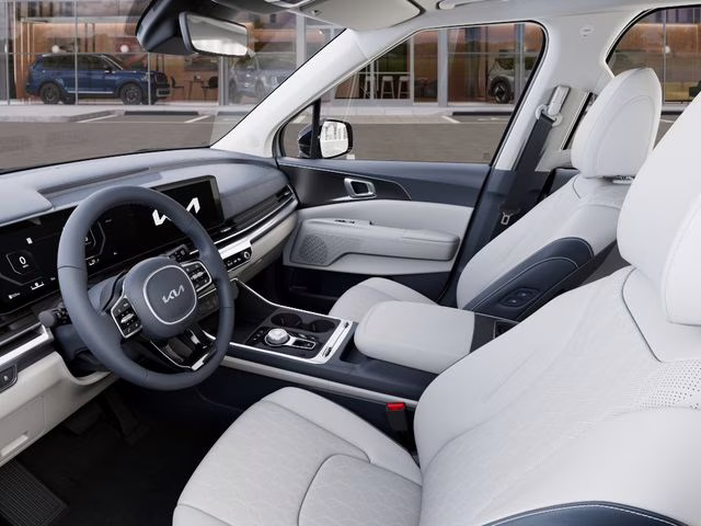 2026 Snow White Pearl Kia Carnival Hybrid SX FWD Van