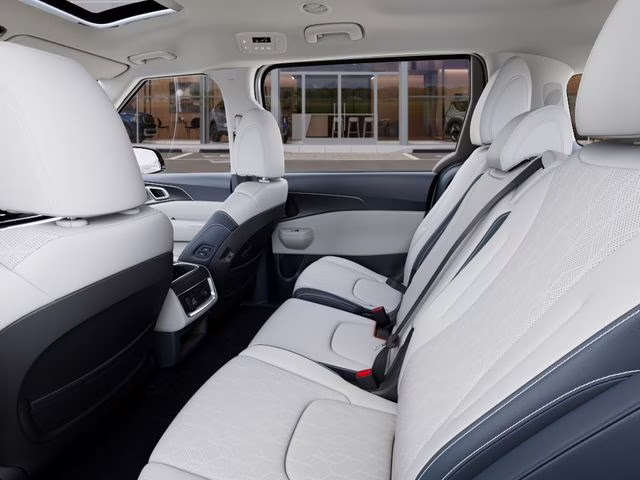 2026 Snow White Pearl Kia Carnival Hybrid SX FWD Van