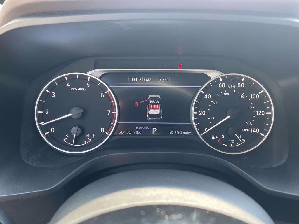 2023 Pearl White Tricoat Nissan Rogue SV FWD SUV