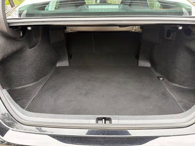 2023 Midnight Black Metallic Toyota Camry LE FWD Sedan