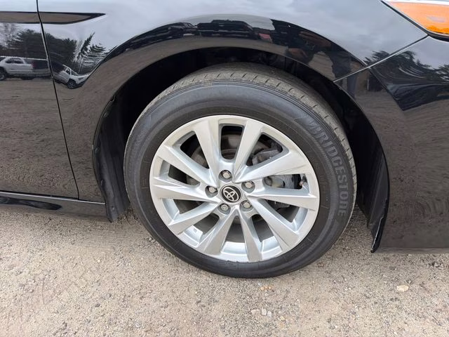 2023 Midnight Black Metallic Toyota Camry LE FWD Sedan