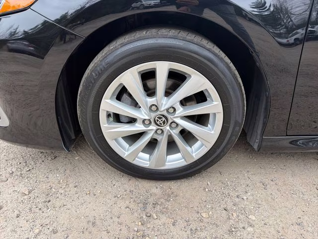 2023 Midnight Black Metallic Toyota Camry LE FWD Sedan