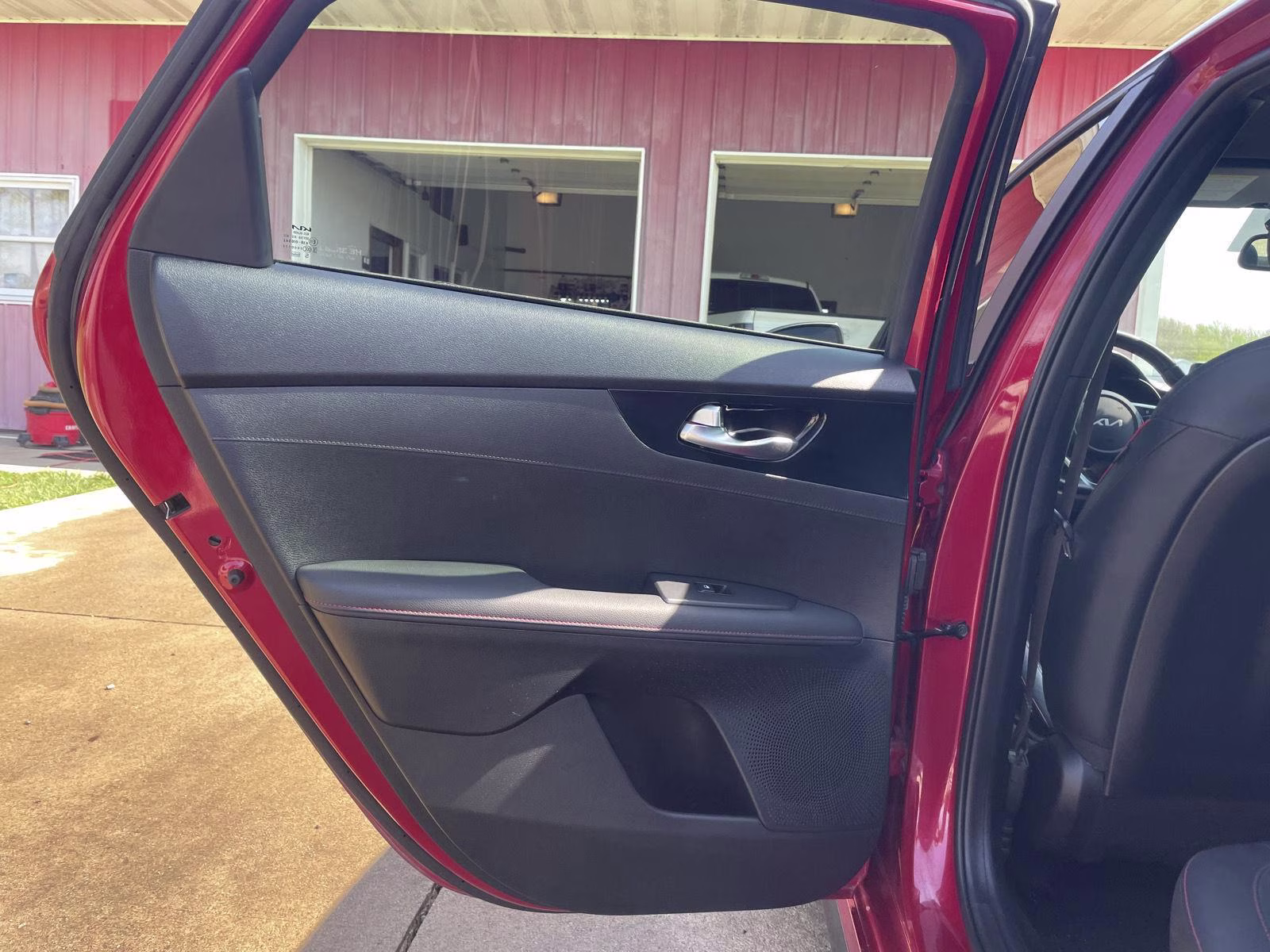 2023 Currant Red Kia Forte GT FWD Sedan