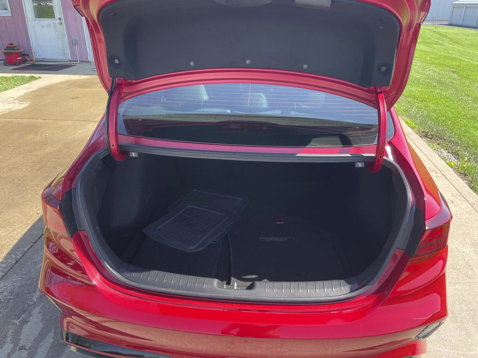 2023 Currant Red Kia Forte GT FWD Sedan