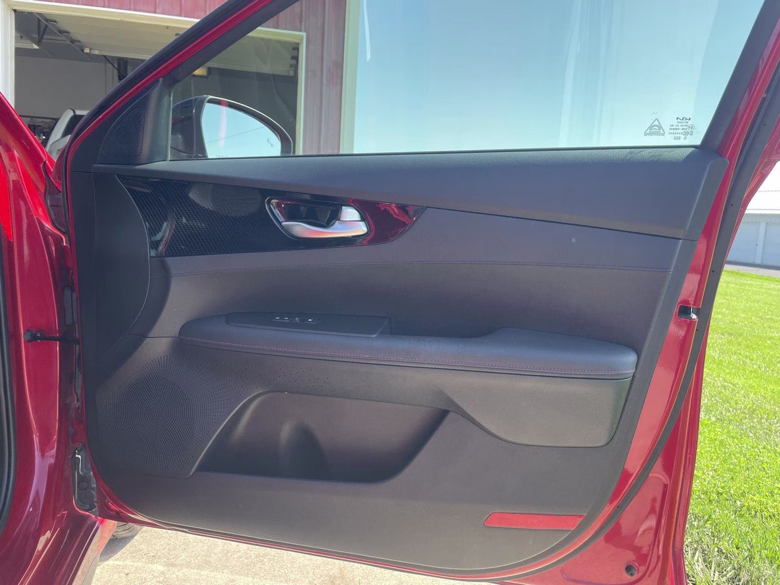 2023 Currant Red Kia Forte GT FWD Sedan