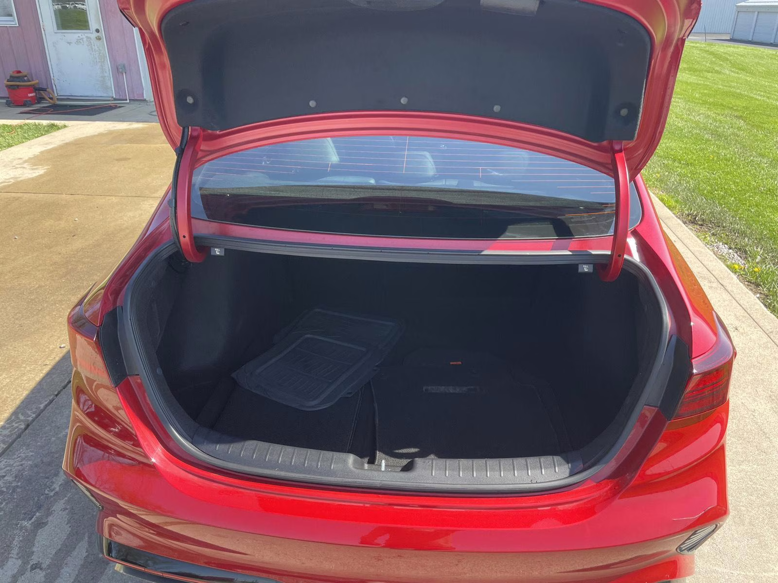 2023 Currant Red Kia Forte GT FWD Sedan
