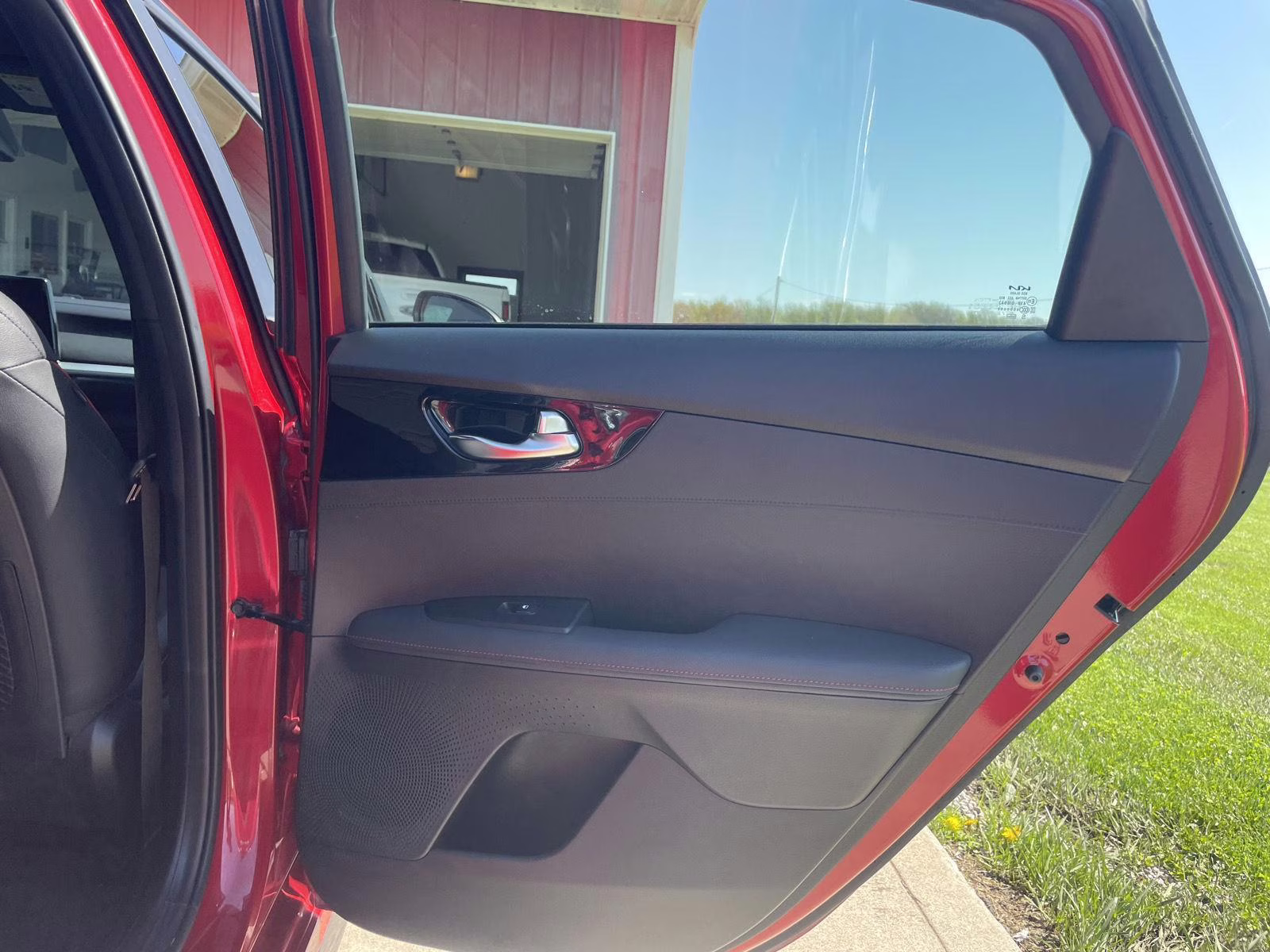 2023 Currant Red Kia Forte GT FWD Sedan