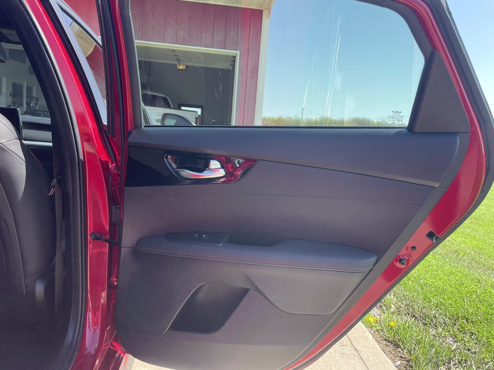 2023 Currant Red Kia Forte GT FWD Sedan