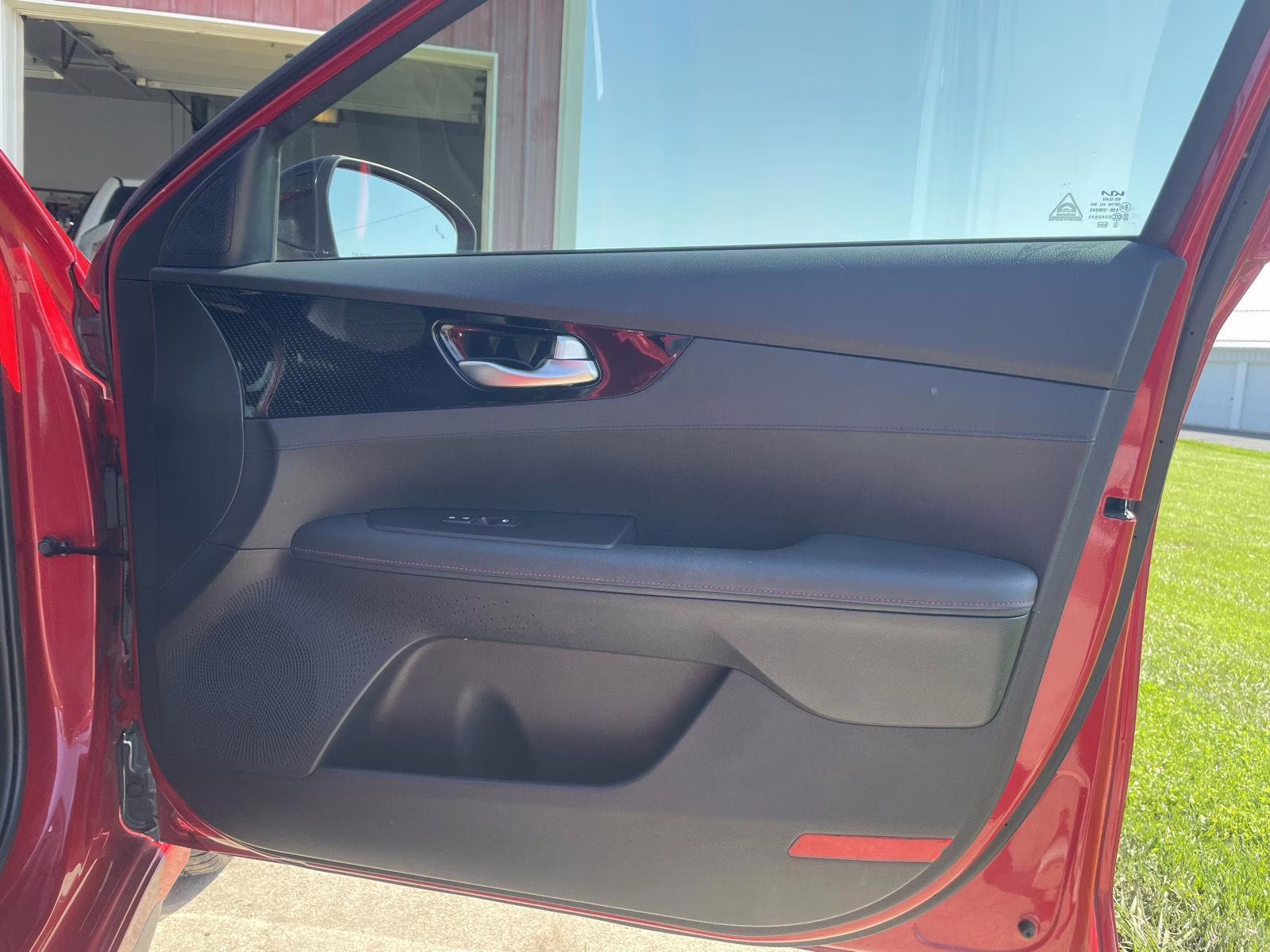 2023 Currant Red Kia Forte GT FWD Sedan