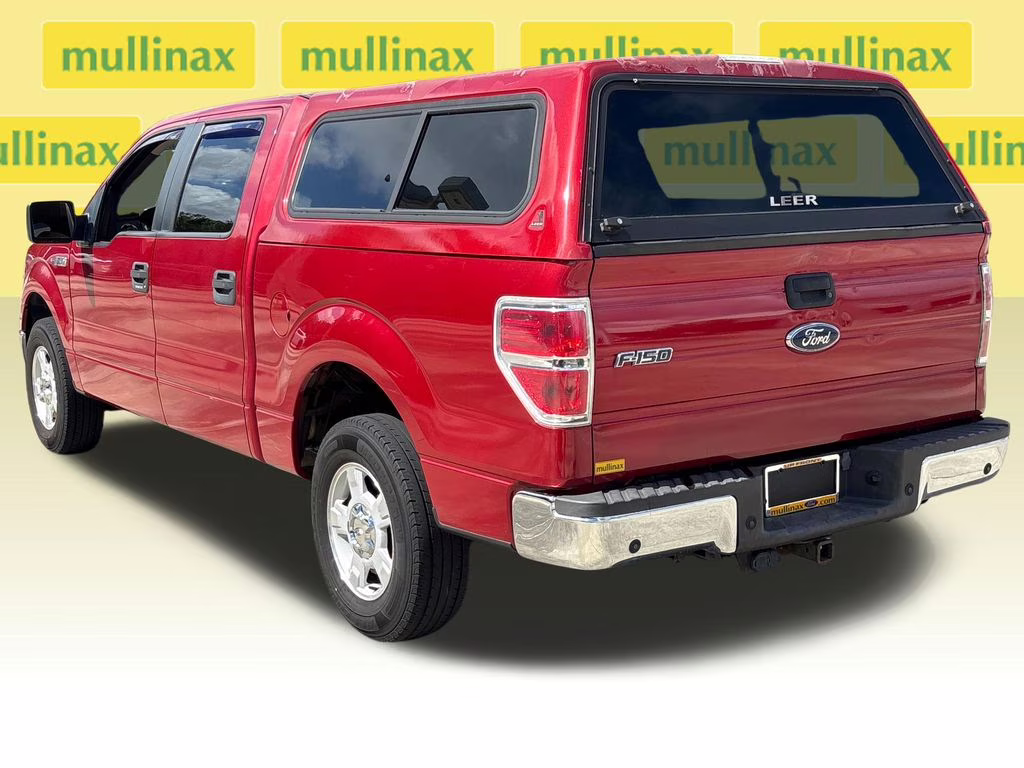 2010 Red Candy Metallic Tinted Clearcoat Ford F-150 XLT RWD Truck