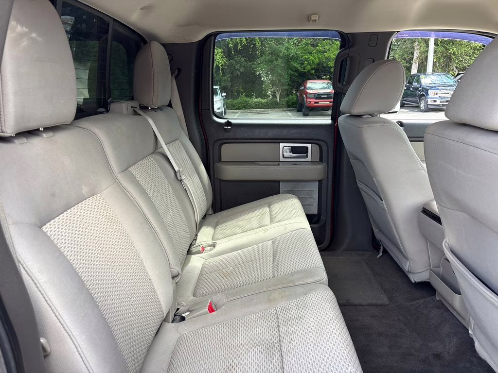 2010 Red Candy Metallic Tinted Clearcoat Ford F-150 XLT RWD Truck