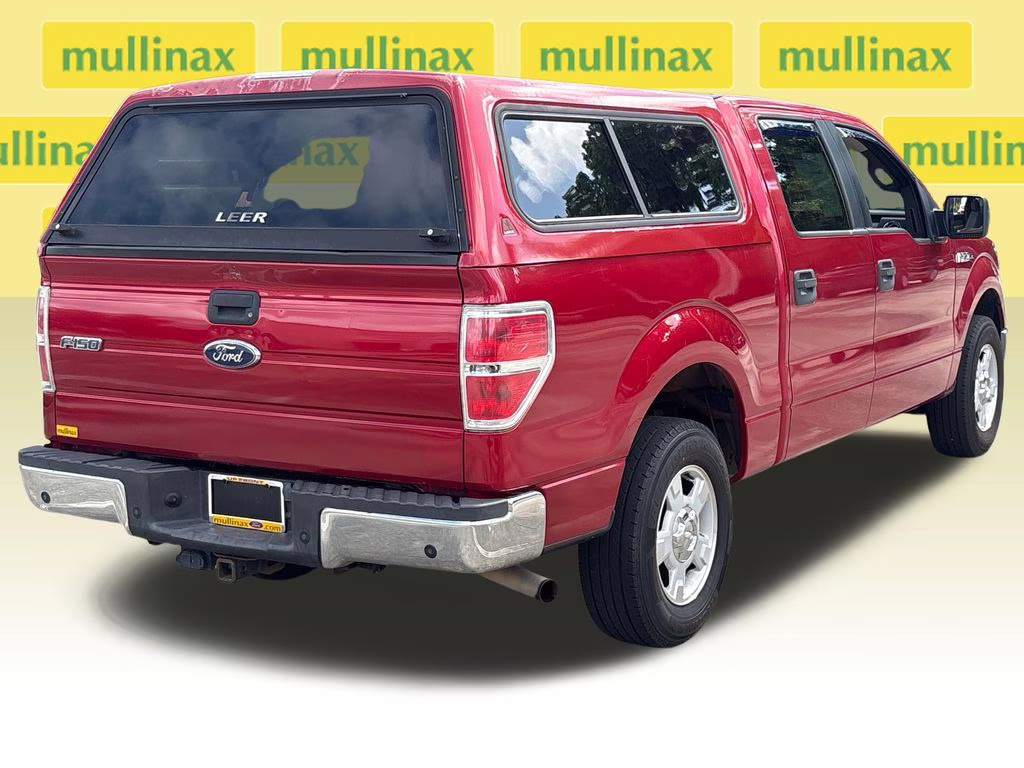 2010 Red Candy Metallic Tinted Clearcoat Ford F-150 XLT RWD Truck