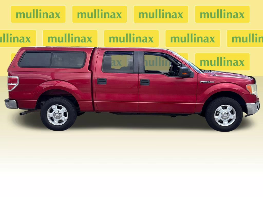 2010 Red Candy Metallic Tinted Clearcoat Ford F-150 XLT RWD Truck