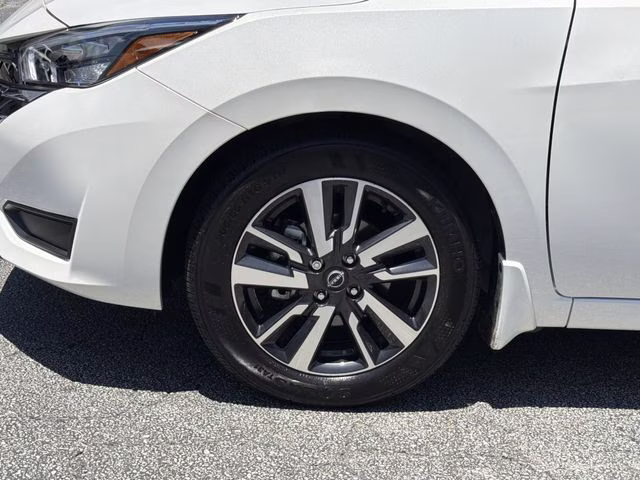 2025 Aspen White Tricoat Nissan Versa 1.6 SV FWD Sedan