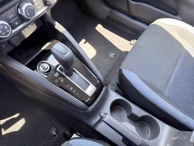 2025 Aspen White Tricoat Nissan Versa 1.6 SV FWD Sedan