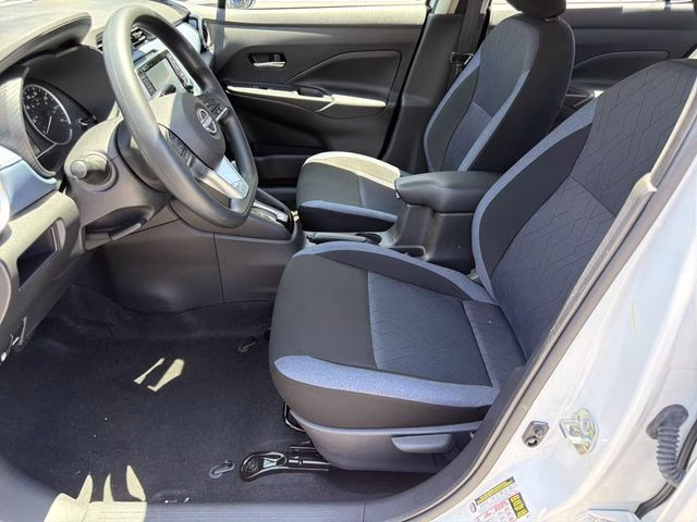 2025 Aspen White Tricoat Nissan Versa 1.6 SV FWD Sedan